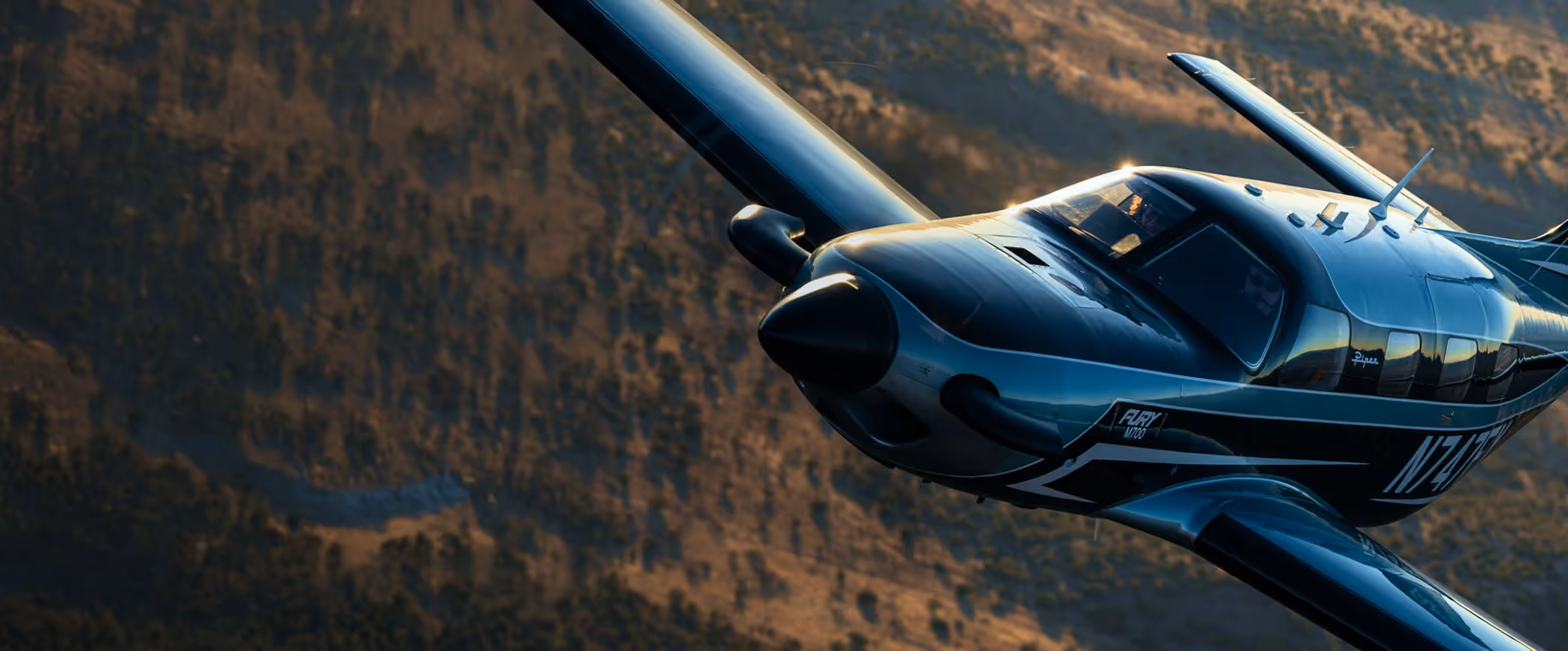 Piper M700 Fury in flight