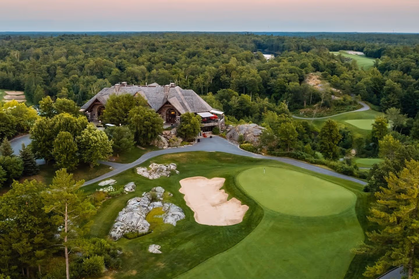 Muskoka Bay Club above the course at dusk
