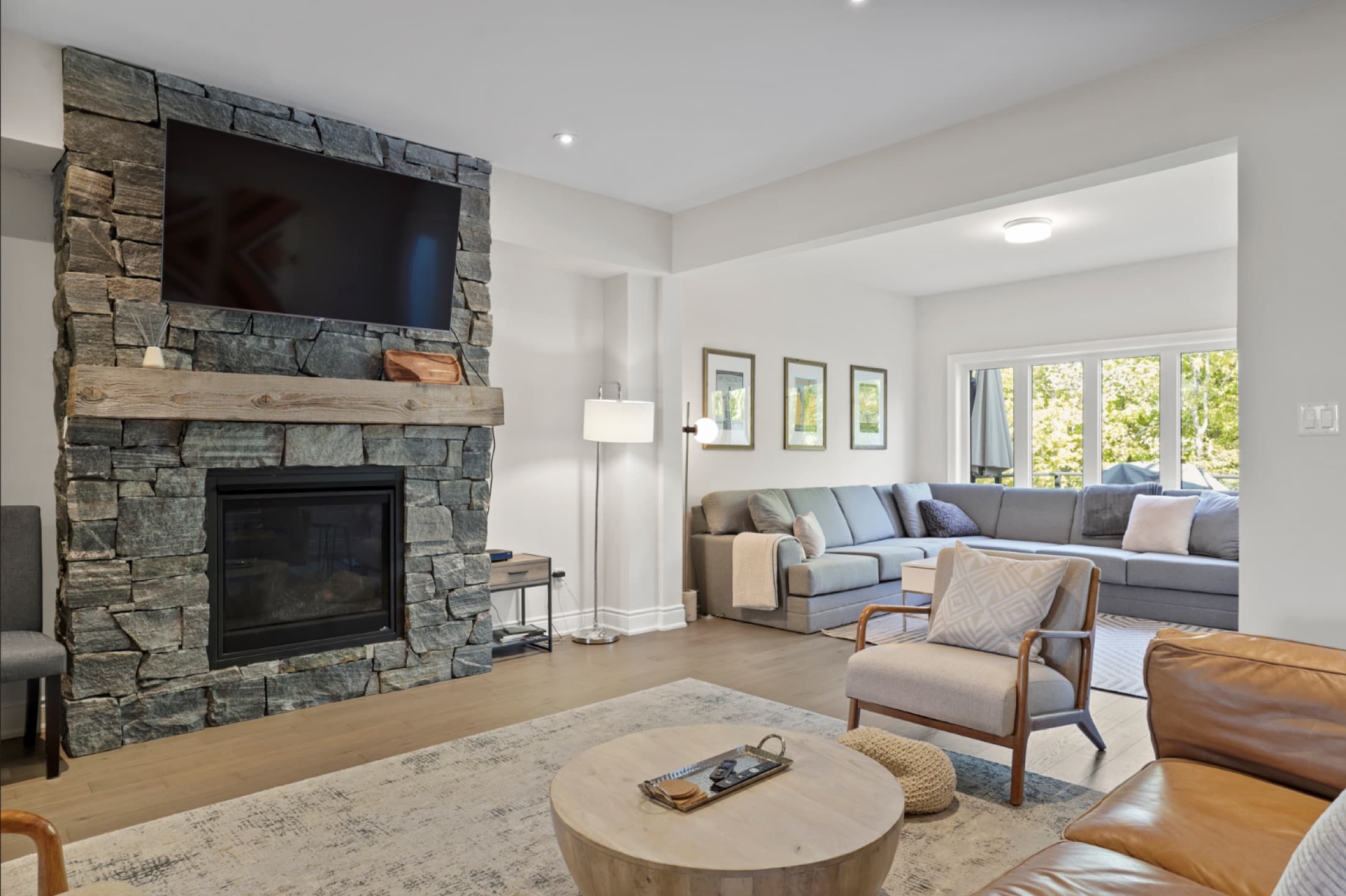 The living room in the four-bedroom Fairway Villa at Muskoka Bay Resort