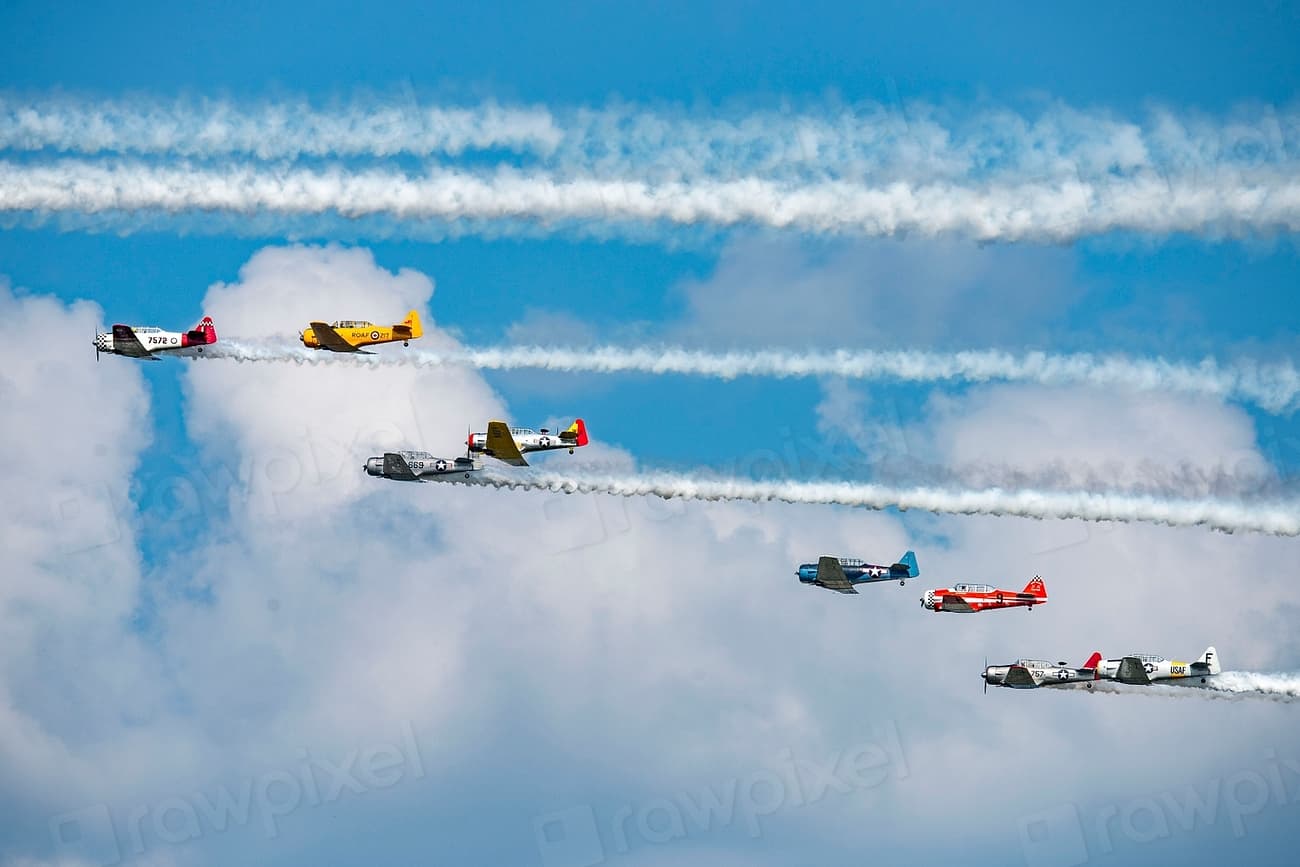 Warbirds flying in formation at the AirVenture airshow