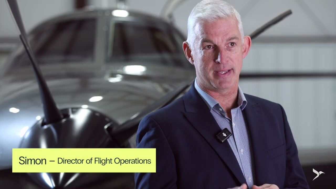 Simon, NectAir's Director of Flight Operations, beside an aircraft in the hangar