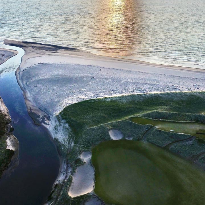 A links green at Cabot on Cape Breton at sunset